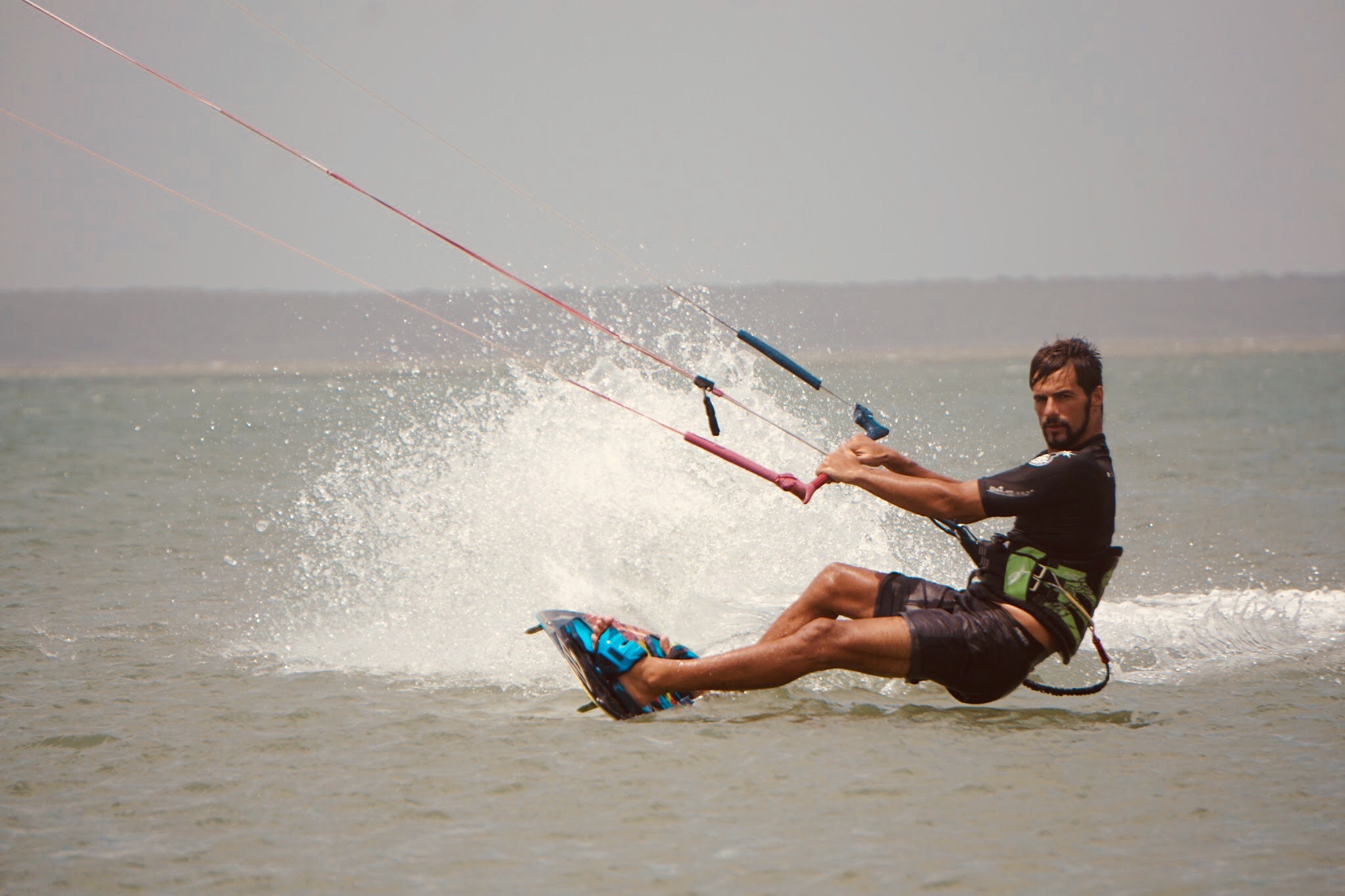 Viktor riding a twintip kiteboard in Sri Lanka